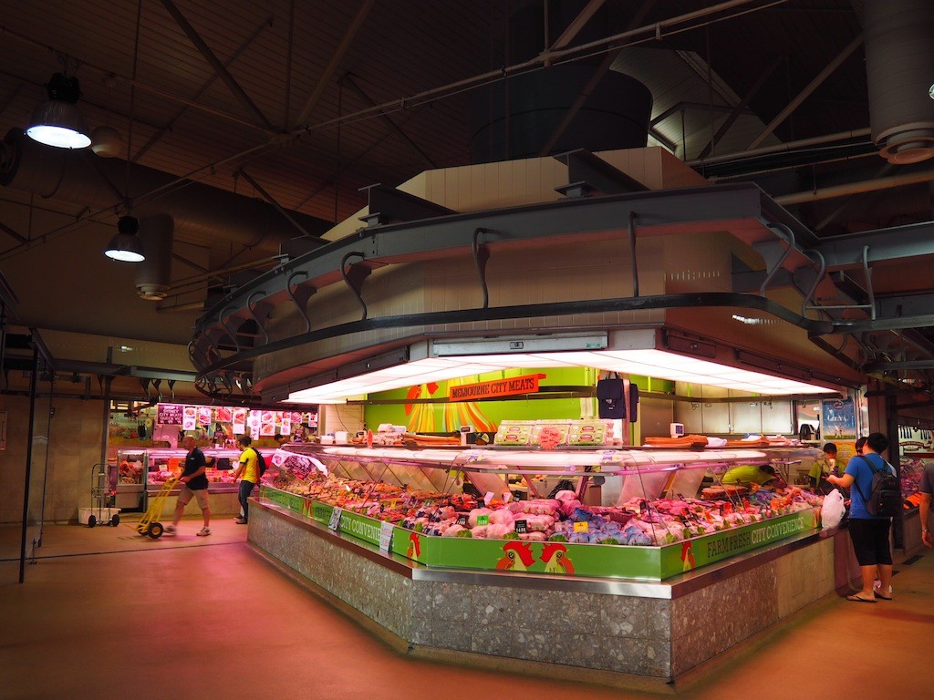 Fresh meat is bought into the market hall using rails and pulleys on the ceiling