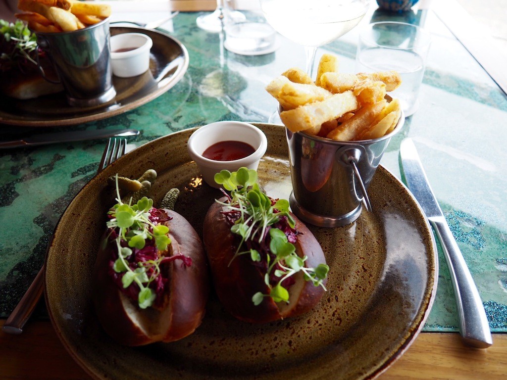 Tucking into Pulled Pork Sliders at Pebble Beach