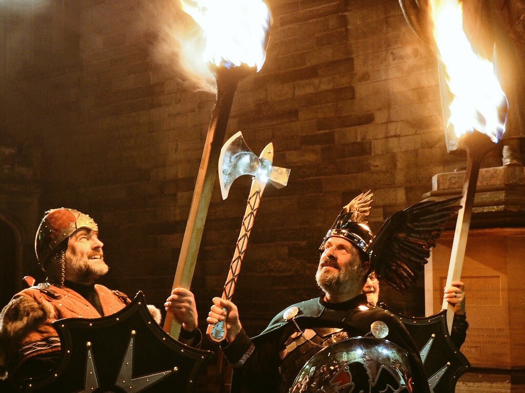 Friendly Vikings from the Up Helly Aa lead the Torchlight Procession