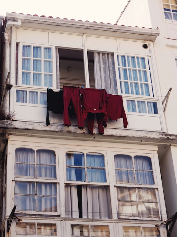 This traditional indoor balcony is common in Galicia - it provides a place to enjoy the sunlight and spy on your neighbours whilst being protected from the wild coastal elements