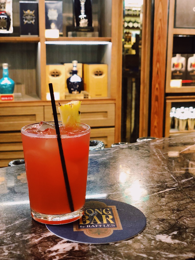 Singapore Sling at Raffles Long Bar Singapore Changi Airport